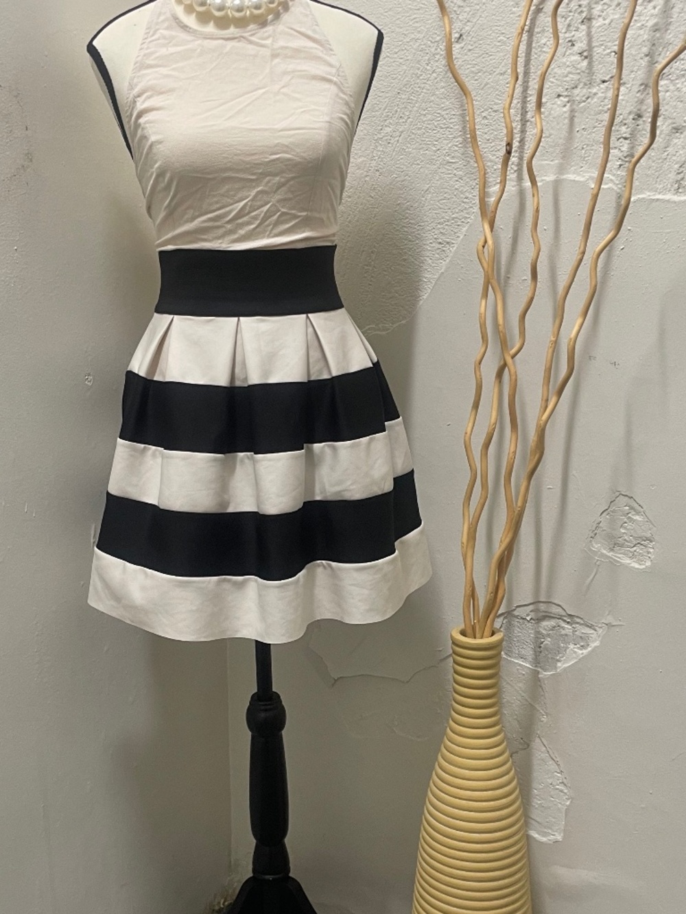 Rinascimento black and white horizontally striped mini skirt.